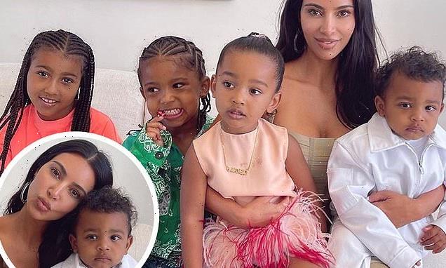 Kim gathers ALL FOUR kids together on the couch for heartwarming album ...